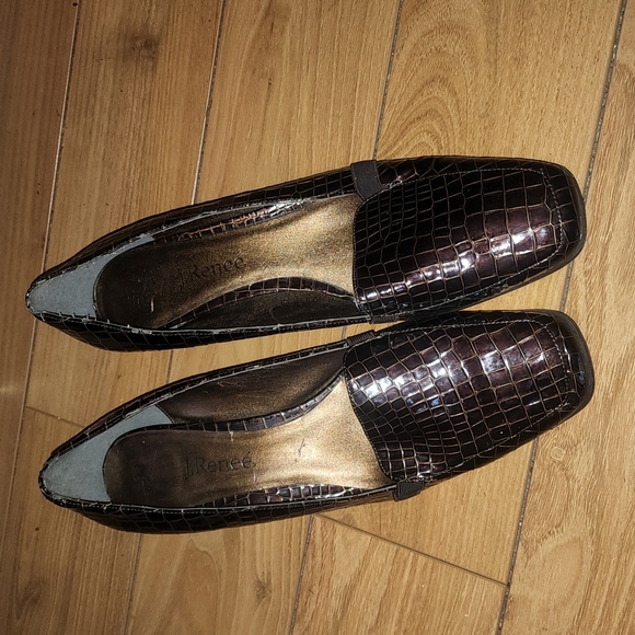 Very fashionable slip on heels...no scares or scrapes...mint pre-owned condition